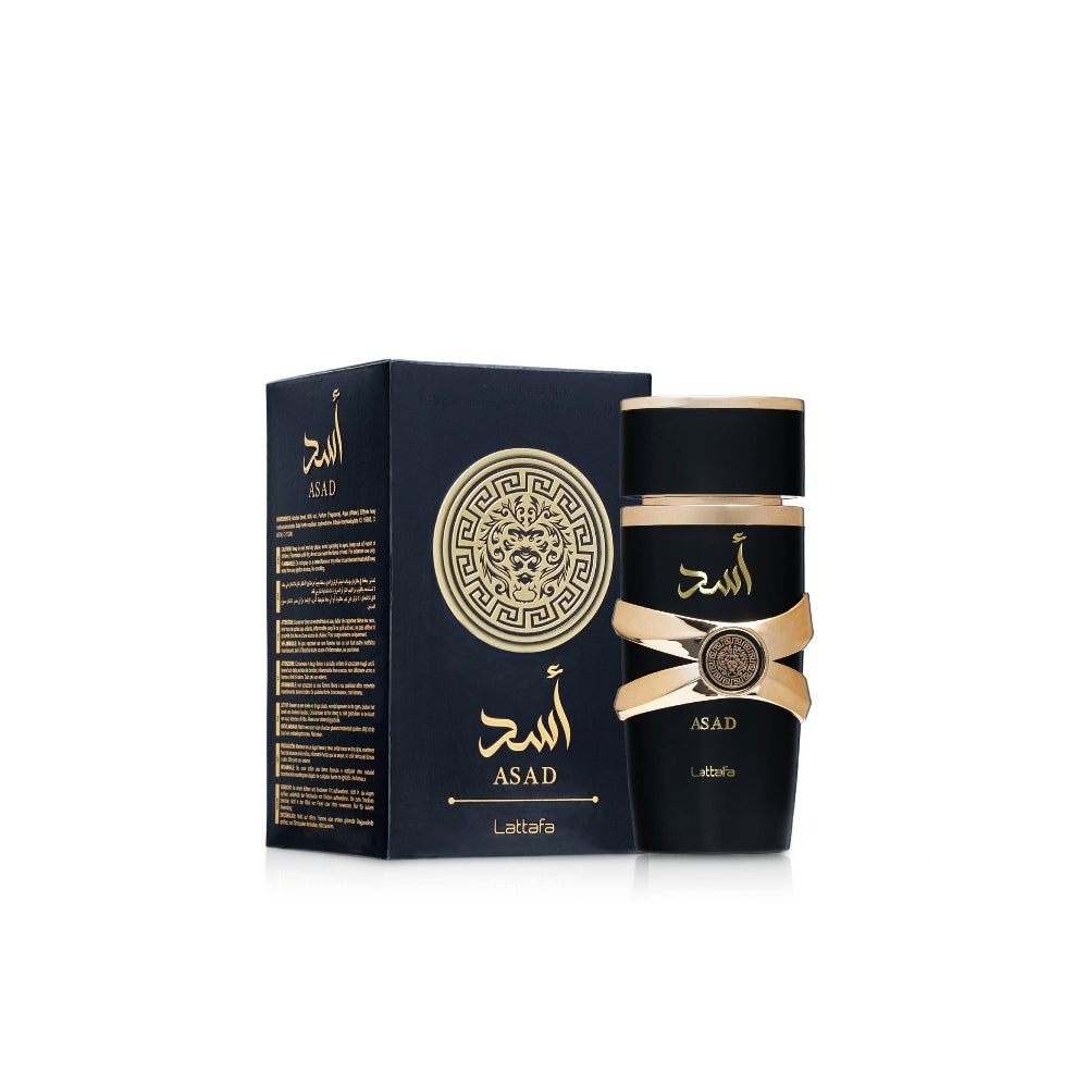 Black and gold perfume bottle with packaging on a white background